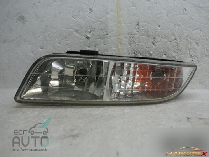 KG Mobility Rexton 2002 — противотуманная фара левая (водительская сторона)