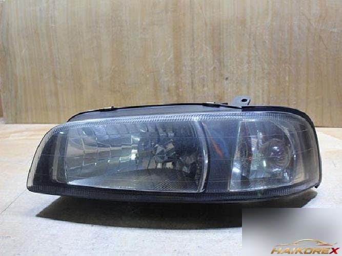 Renault SM5 1999 — фара левая