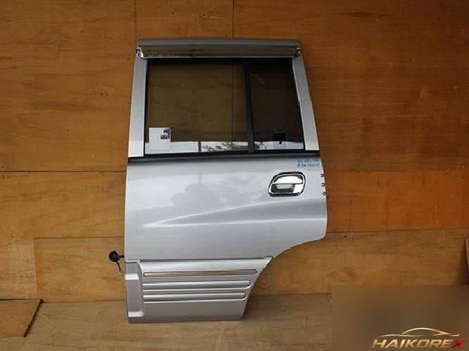 SsangYong Musso 2004 — задняя дверь левая