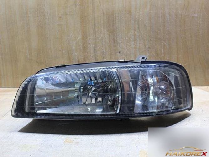 Renault SM5 2000 — фара левая