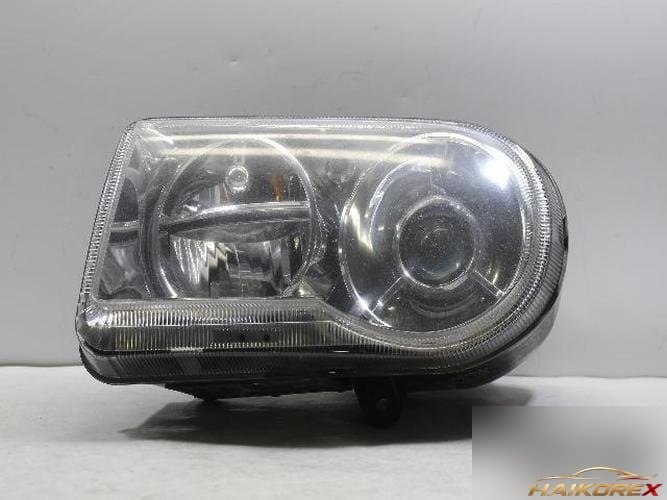 Chrysler 300 2007 — фара левая 04805761AH
