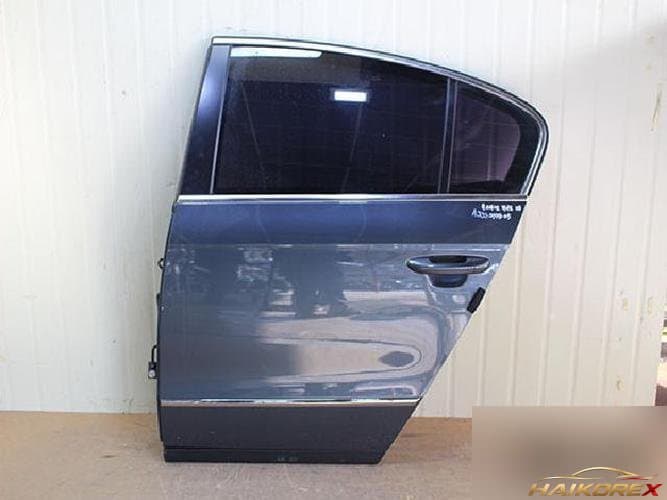 Volkswagen Passat 2009 — дверь задняя левая