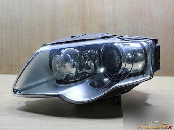 Volkswagen Passat 2008 — фара левая HID