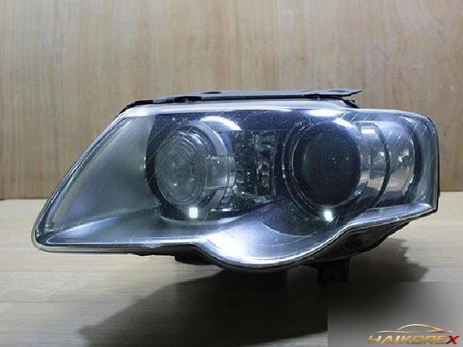 Volkswagen Passat 2008 — фара левая HID