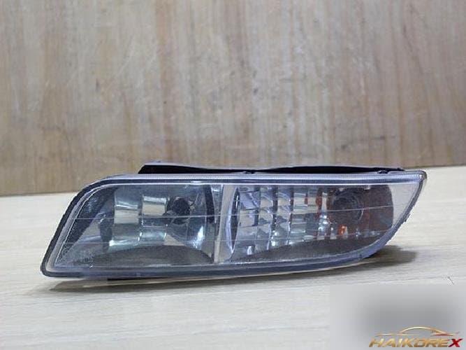 KG Mobility Rexton 2004 — противотуманная фара левая (сторона водителя)