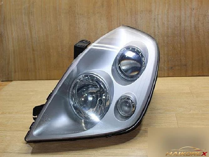 KG Mobility Rexton 2002 — фара левая