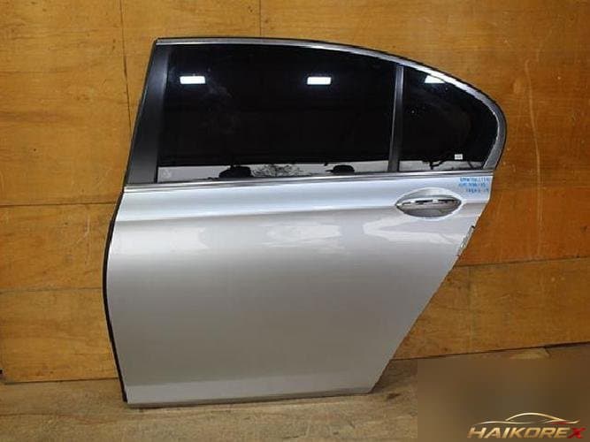 BMW 7 серии 2009 — дверь задняя левая