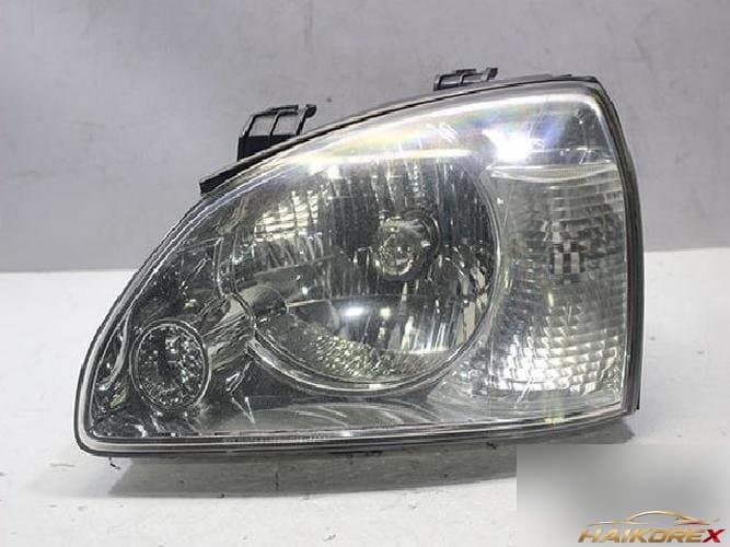 Kia Carens 2004 — фара левая 6