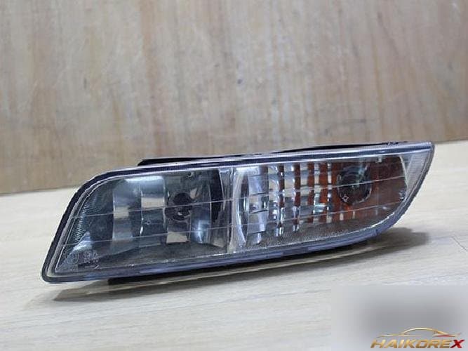 KG Mobility Rexton 2003 — противотуманная фара левая (водительская сторона)