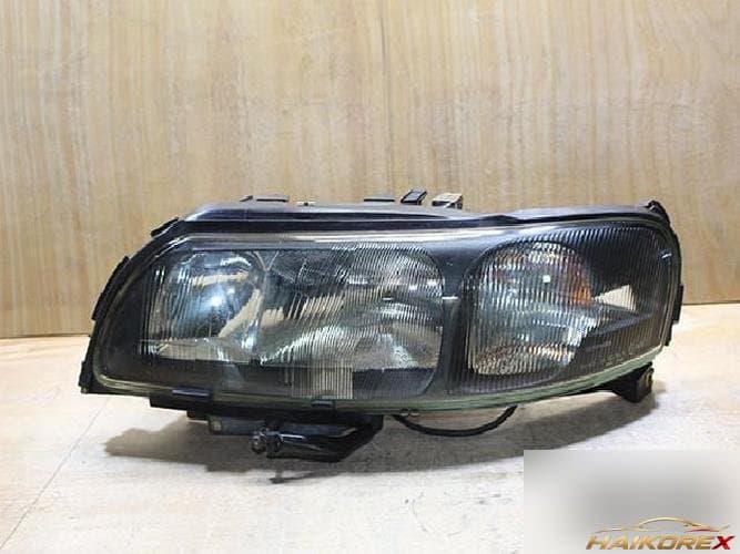 Volvo V70 2001 — фара левая 8693565