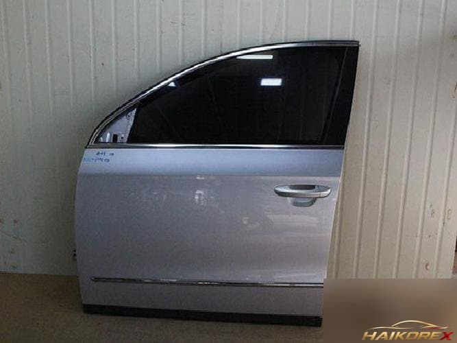 Volkswagen Passat 2010 — передняя дверь левая