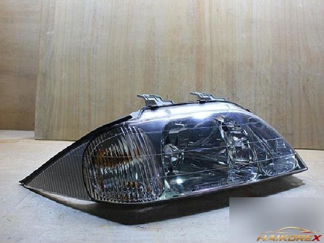 KG Mobility Musso 2001 — фара правая