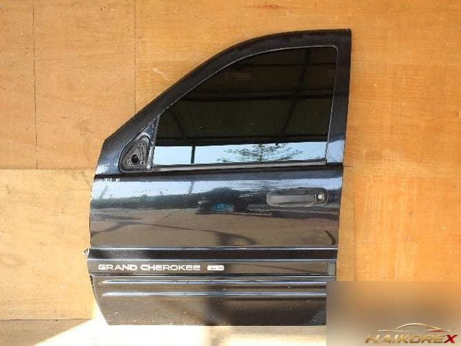Jeep Grand Cherokee 2004 — передняя дверь левая