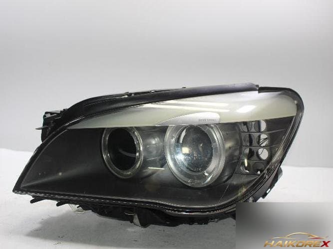 BMW 7 Series 2009 — фара левая