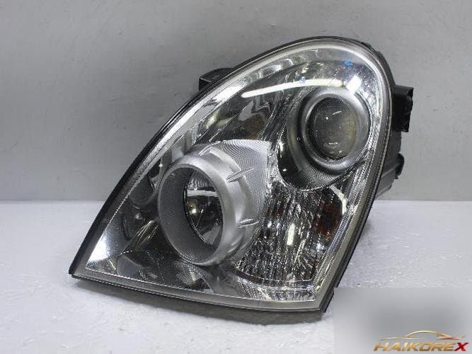 KG Mobility Rexton 2011 — фара левая