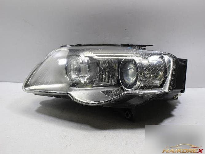 Volkswagen Passat 2011 — фара левая (HID)