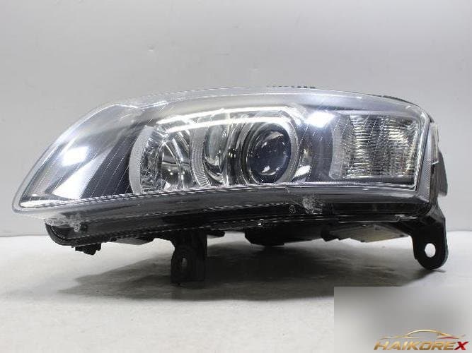 Audi A6 2006 — фара левая HID