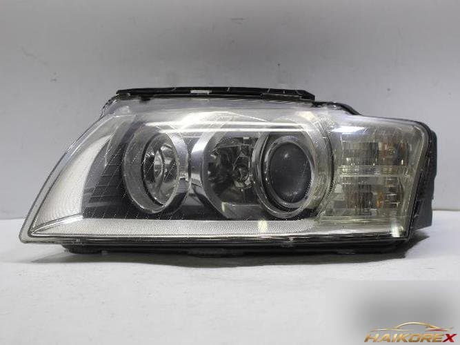 Audi A8 2009 — фара левая HID