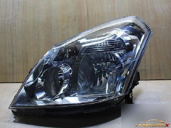 Renault SM7 2009 — фара левая