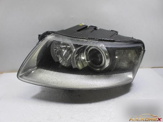 Audi A6 2009 — фара левая HID