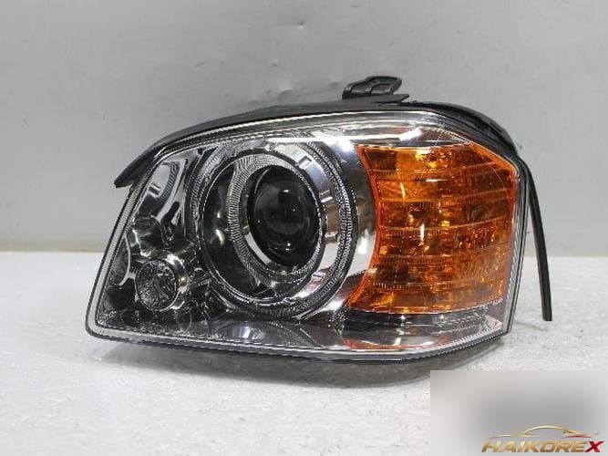 Kia Optima 2004 — фара левая 921013C5