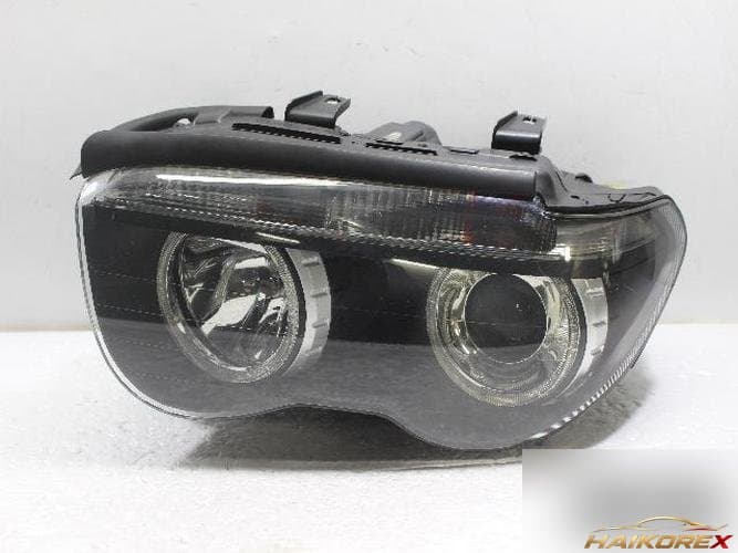 BMW 7 Series 2004 — фара левая HID