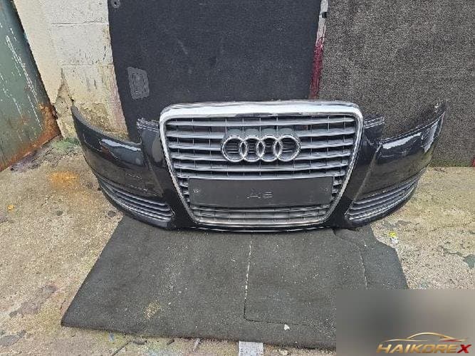 Audi A6 2010 — передний бампер