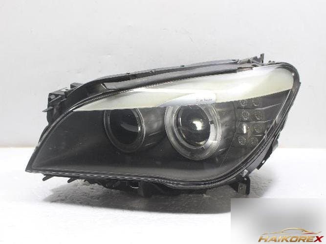 BMW 7 Series 2009 — фара левая