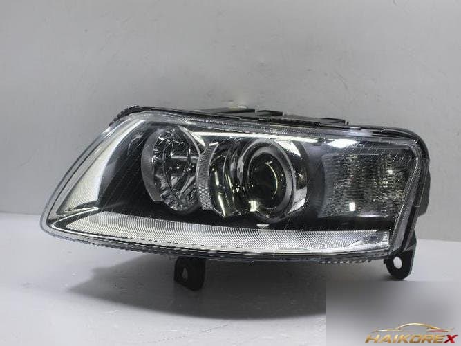 Audi A6 2009 — фара левая