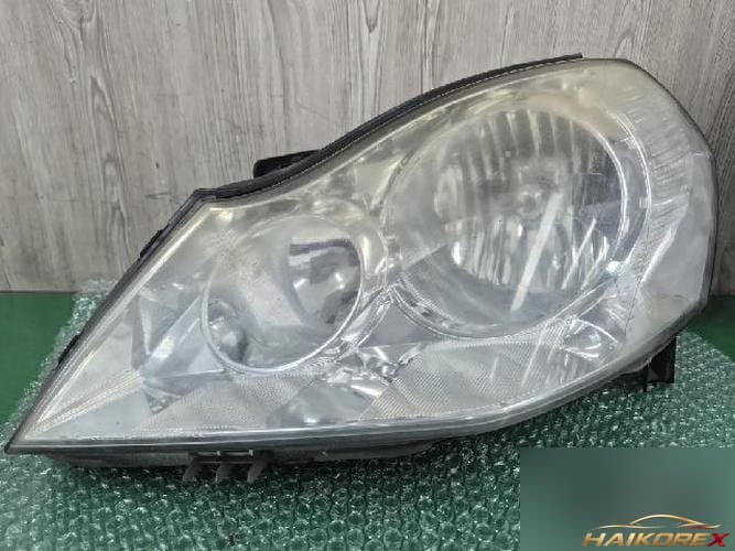 Renault SM5 2010 — фара левая (HID)