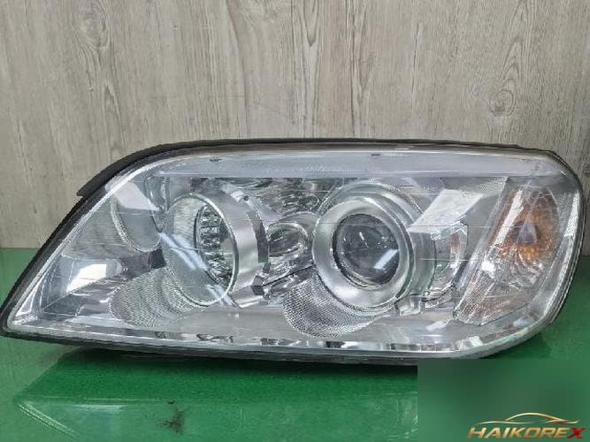 Daewoo Winstorm 2008 — фара левая 00015486 1