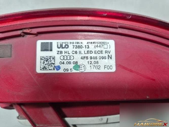 Audi A6 2009 — задний фонарь левый (комбинированный) 4F0945095