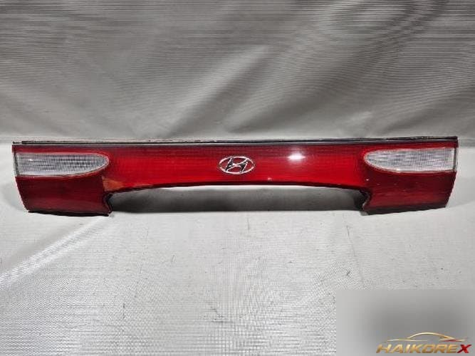Hyundai Marcia 1997 — накладка крышки багажника со светом номера