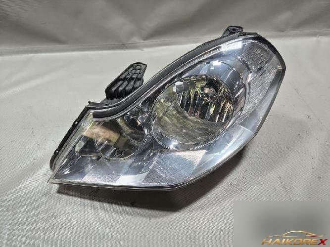 Renault SM5 2009 — фара левая HID