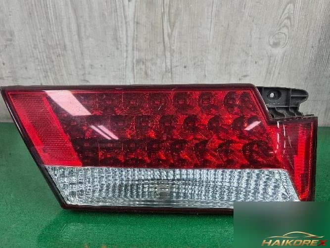 Hyundai Grandeur 2006 — накладка крышки багажника левая 92403-3LO