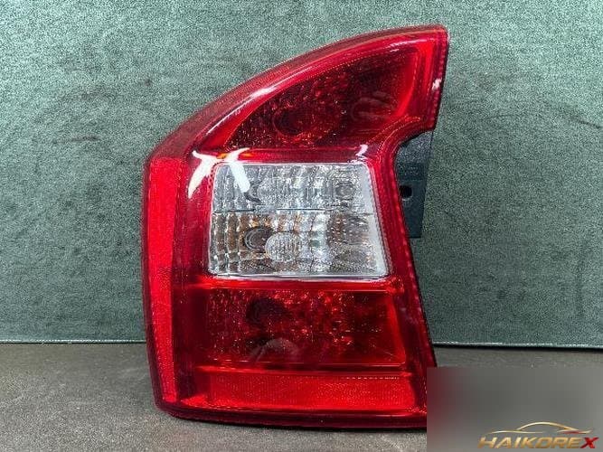 Kia Carens 2007 — комбинированный фонарь задний левый (водителя)