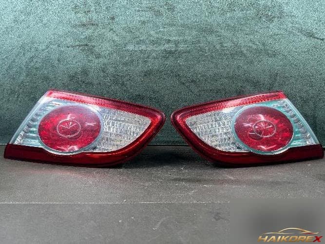 Hyundai Santa Fe 2010 — накладка задней двери (левая)