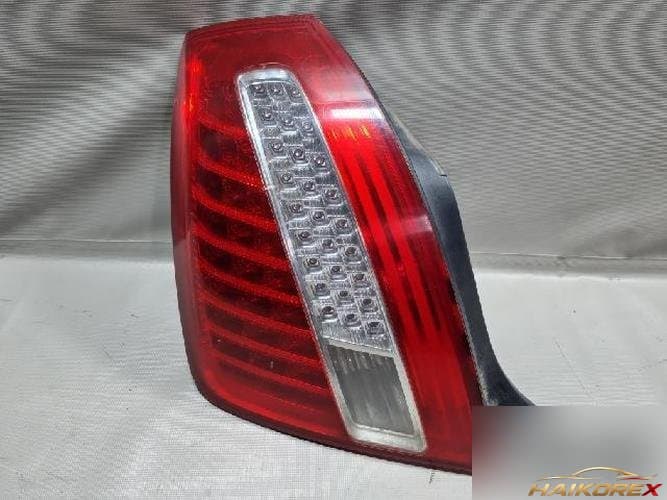 Kia Opirus 2010 — задний комбинированный фонарь левый (водителя)