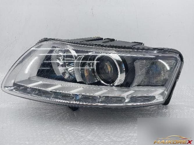 Audi A6 2009 — фара левая