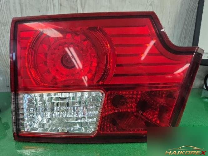 SsangYong Kyron 2008 — накладка крышки багажника левая