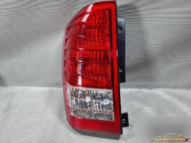 Kia Carnival 2010 — комбинированный фонарь (задний) левый