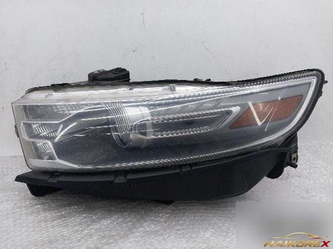 Ford Taurus 2014 — фара левая DG13-13006-AF