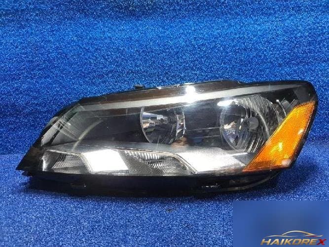 Volkswagen Passat 2012 — фара левая 561941006