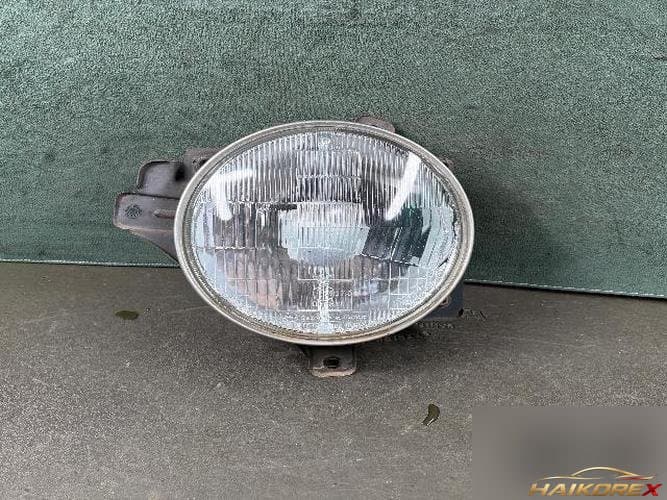 KG Mobility Korando 2005 — фара левая