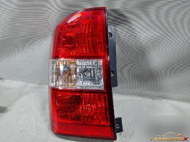 Kia Carnival 2013 — комбинированный фонарь задний левый (водительский)
