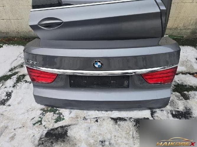 BMW 5 Series 2010 — крышка багажника