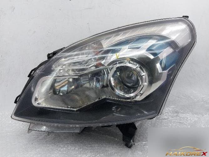 Renault QM5 2011 — фара головного света левая (HID)