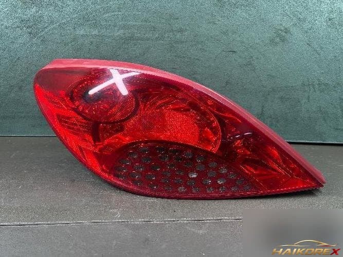 Peugeot 207 2009 — фонарь задний в сборе левый