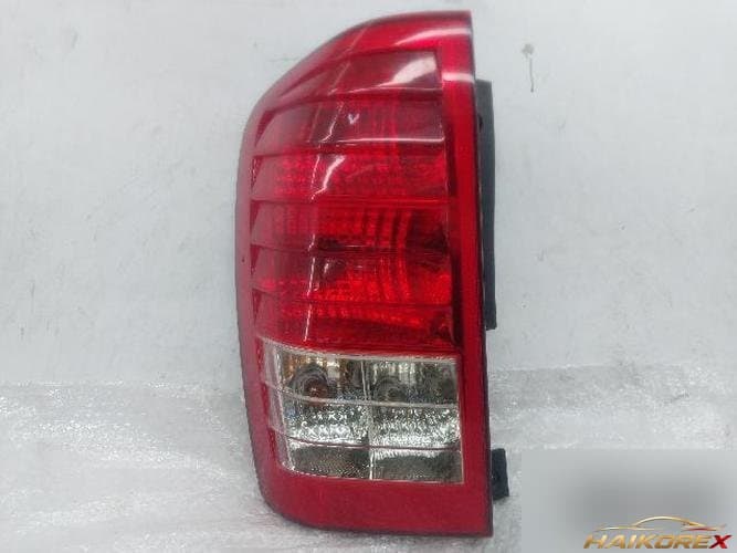 Kia Carnival 2012 — задний фонарь в сборе левый 924-4JO