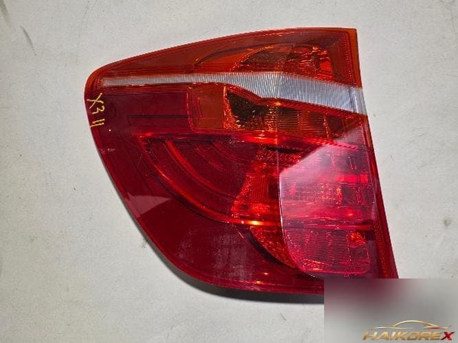 BMW X-series 2011 — фонарь задний левый (наружный) 7217311